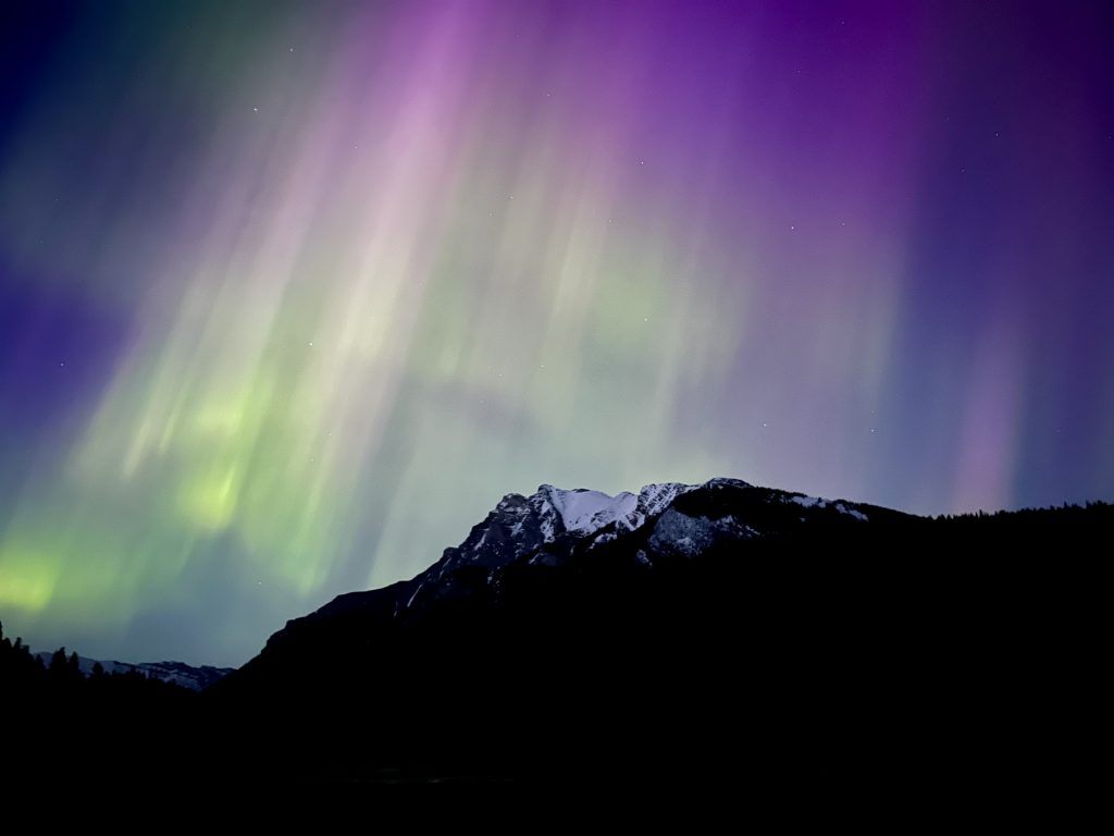 Northern light about a mountain in Banff